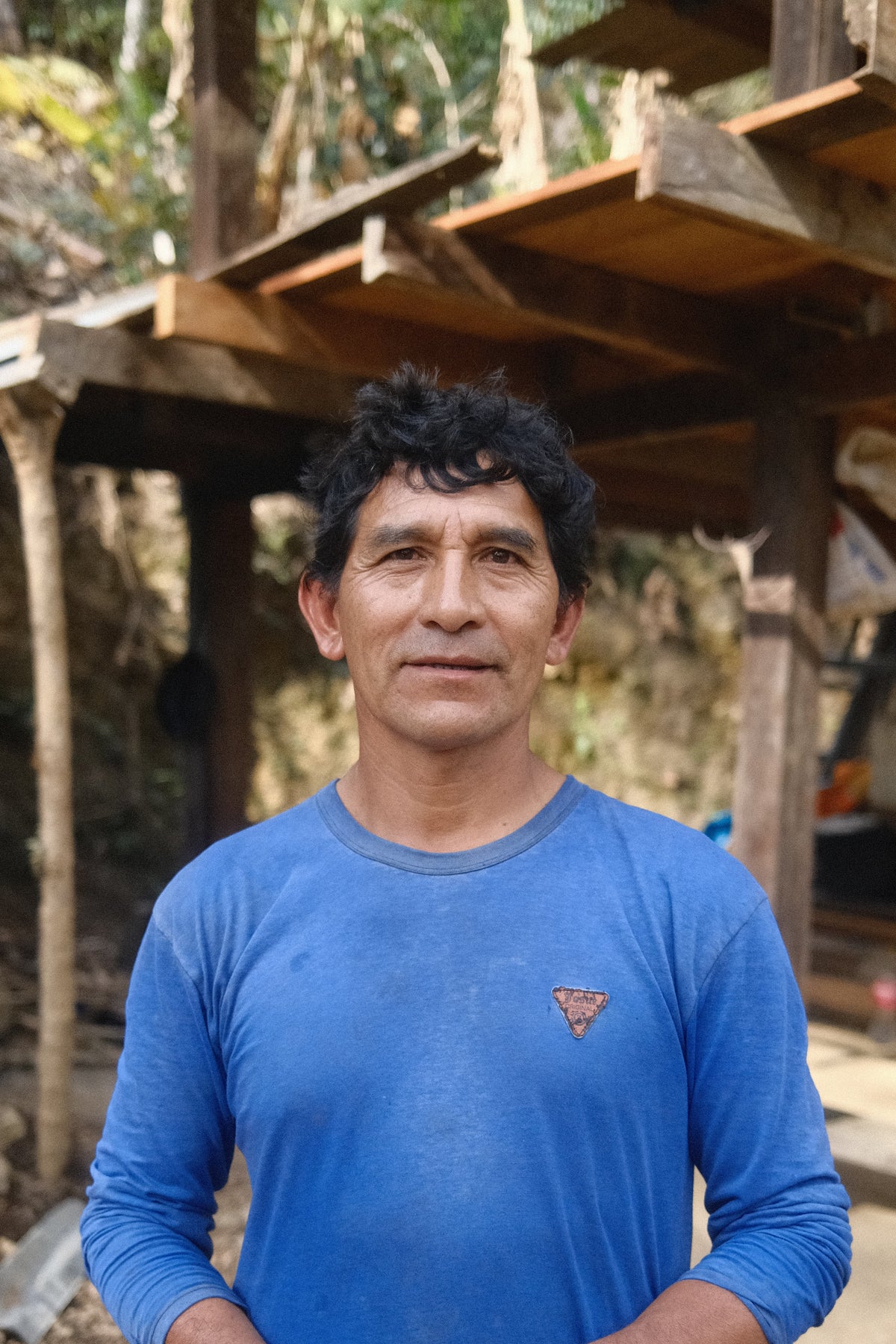 A coffee producer photographed during harvest