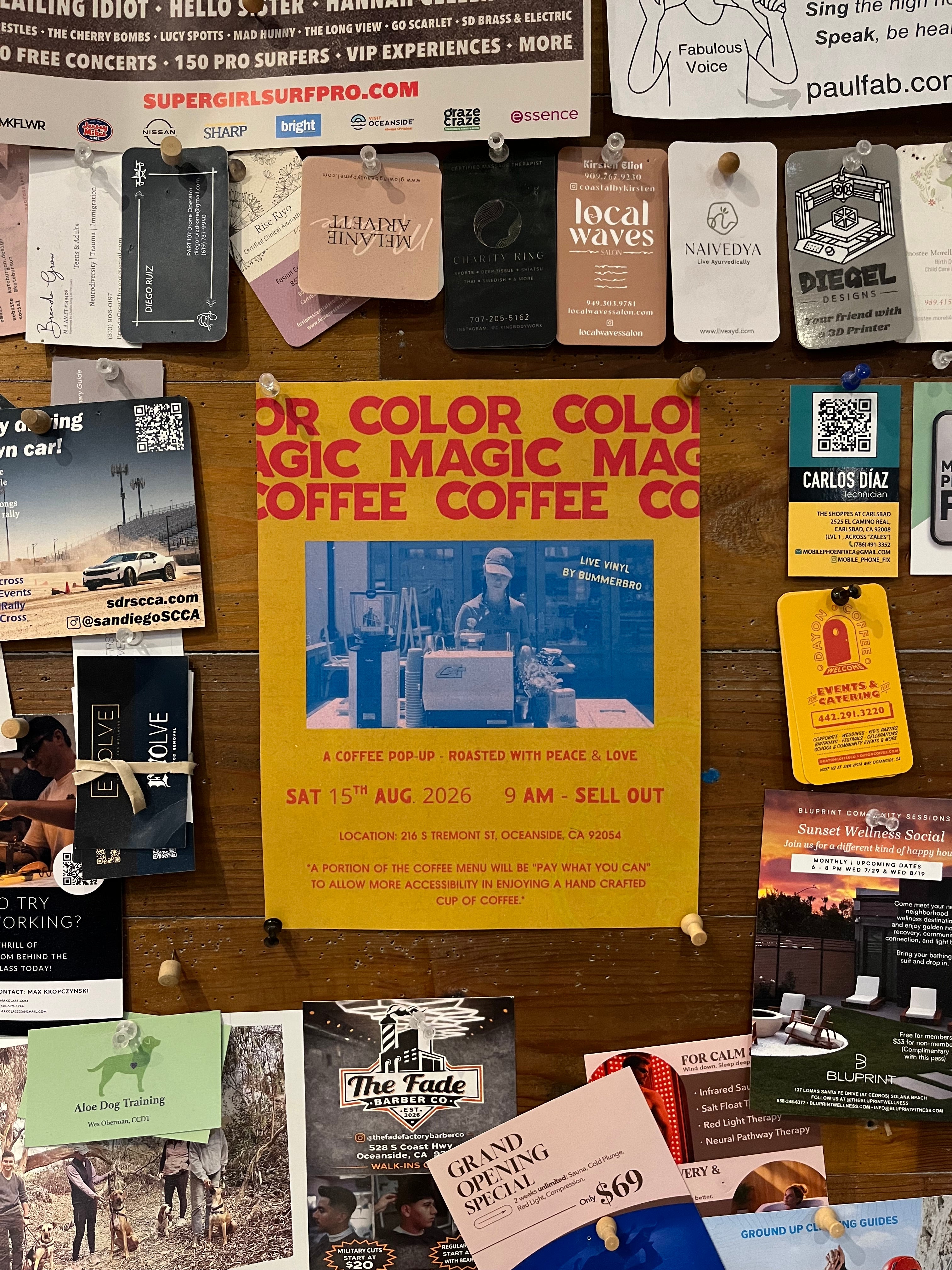 Community noticeboard at Dear Tomorrow with a Color Magic flyer