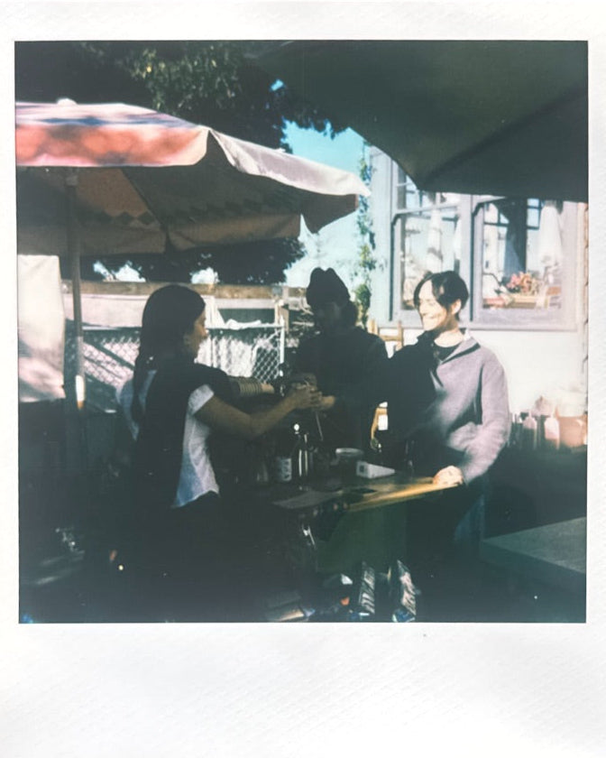 Color Magic coffee cart set up at an outdoor market