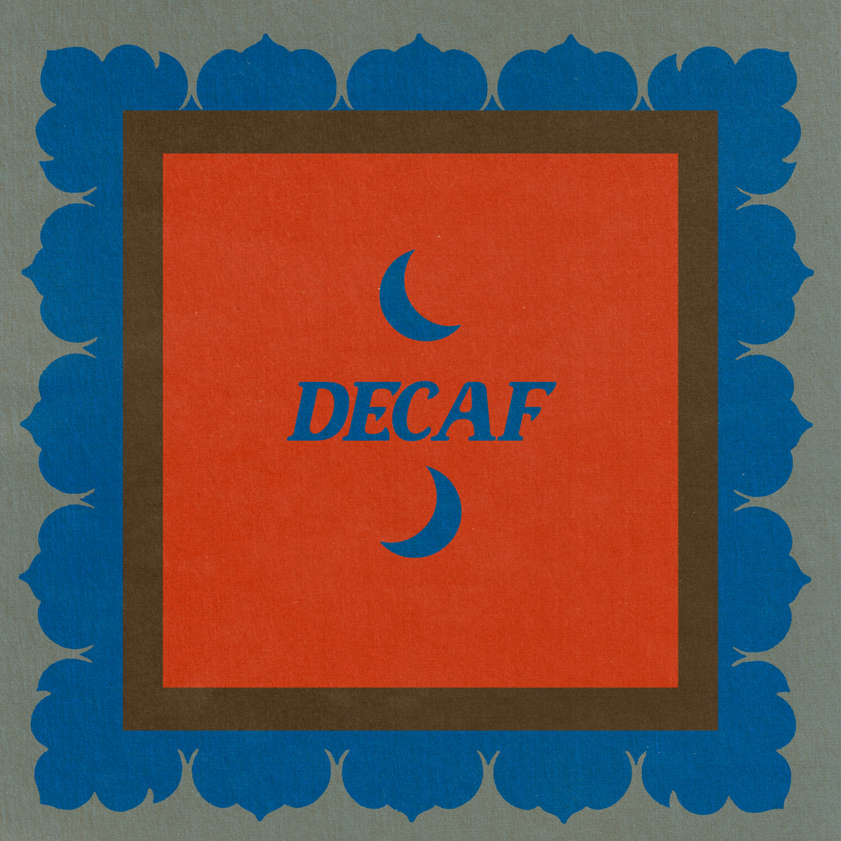 Color Magic Decaf coffee subscription, a blue crescent moon on a red card with a blue scalloped border